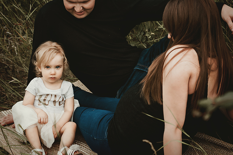 central alberta family maternity photos, Red Deer Photographer, Central Alberta Photographer, Family photos, Family sitting on grass